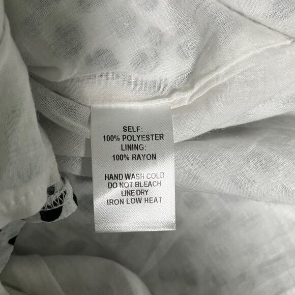 Lulu’s Hottie Dotty Black and White Print open back Romper - Picture 6 of 6